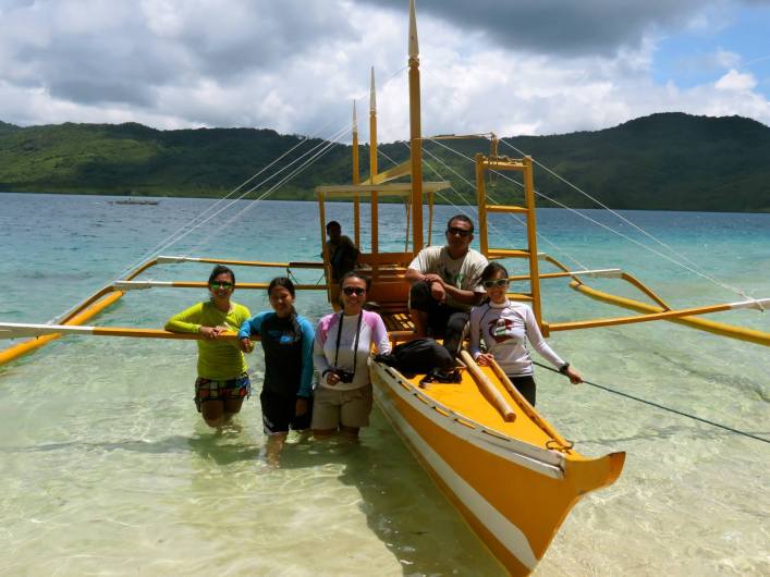 The environmental officers of Pangulasian Island, Apulit Island, Miniloc Island, Lagen Island with environmental enforcement officer Rey Reyes